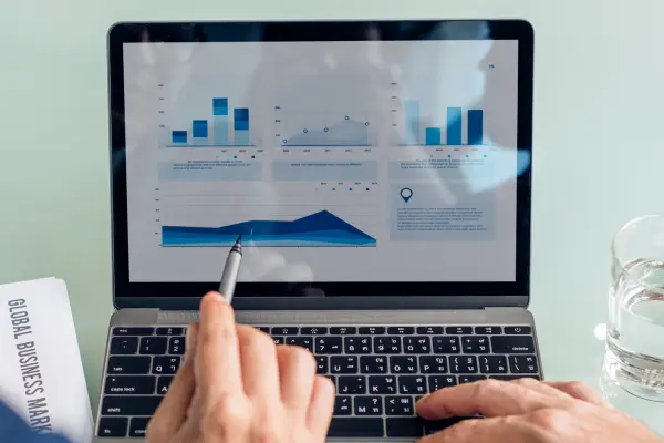 Two professionals discussing the security incident and vulnerability response through the interactive dashboard.