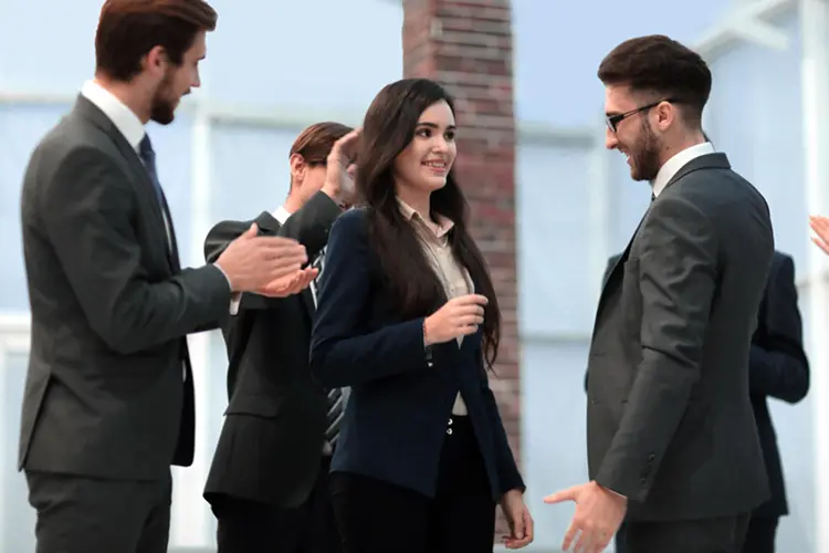 Business professionals meeting and collaborating at ServiceNow Knowledge 2026