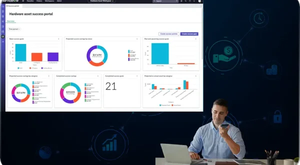 A man at a desk with a laptop, viewing graphs and charts on a screen, related to ServiceNow for BFSI.